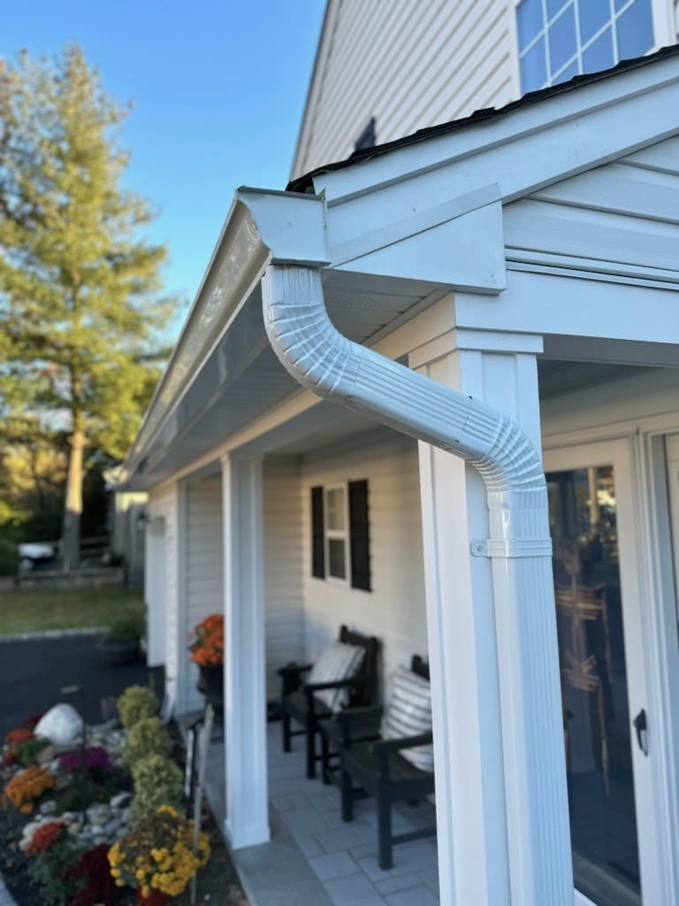 Upgrade Your Home with Pristine White Vinyl Soffits and Spacious K-Style Gutters